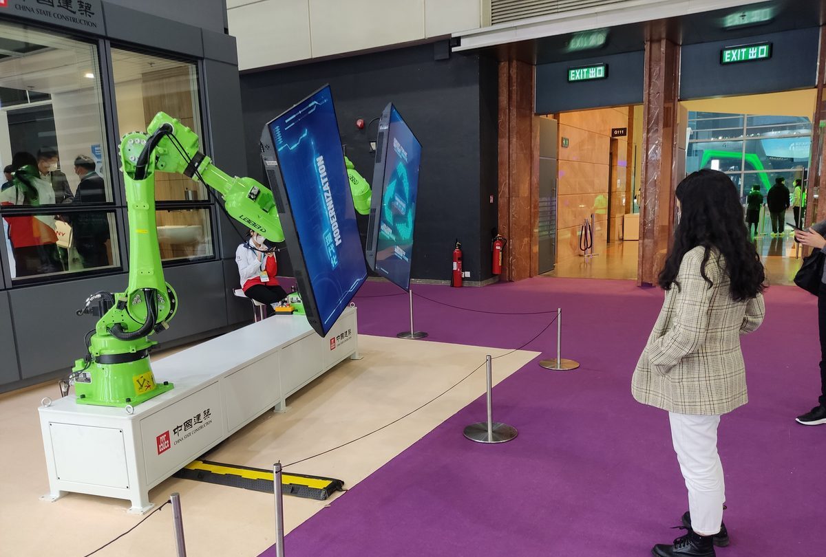 A collaborative robot arm on show at a technology exhibition.